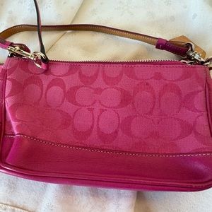 Coach hot pink body bag.